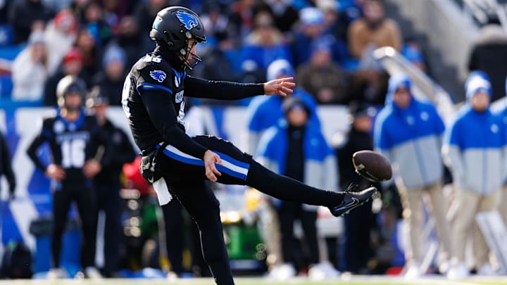 Nov 30, 2024; Lexington, Kentucky, USA; Kentucky Wildcats punter Aidan Laros (48) punts the ball during the first quarter against the Louisville Cardinals at Kroger Field. Mandatory Credit: Jordan Prather-Imagn Images