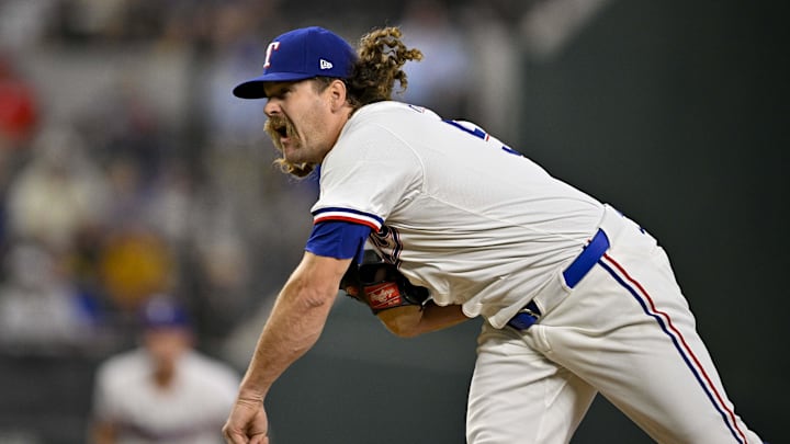 Aug 21, 2024; Arlington, Texas, USA; Texas Rangers relief pitcher Andrew Chafin (59) pitches against the Pittsburgh Pirates during the seventh inning at Globe Life Field. Mandatory Credit: Jerome Miron-Imagn Images