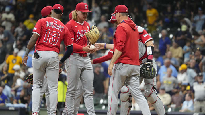 Sep 16, 2025; Milwaukee, Wisconsin, USA; Los Angeles Angels interim manager Ray Montgomery (81) takes Los Angeles Angels pitcher Caden Dana (36) out of the game in the fourth inning against the Milwaukee Brewers at American Family Field. Mandatory Credit: Michael McLoone-Imagn Images Sep 16, 2025; Milwaukee, Wisconsin, USA; Los Angeles Angels interim manager Ray Montgomery (81) takes Los Angeles Angels pitcher Caden Dana (36) out of the game in the fourth inning against the Milwaukee Brewers at American Family Field. Mandatory Credit: Michael McLoone-Imagn Images