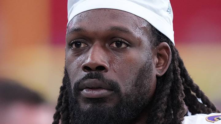 Former Seattle Seahawks linebacker Jadeveon Clowney stands on the sideline