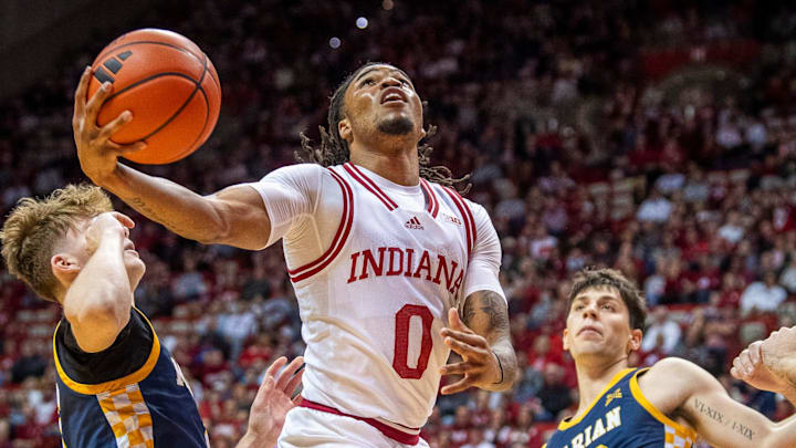 Indiana's Jakai Newton (0) scores against Marian at Simon Skjodt Assembly Hall.