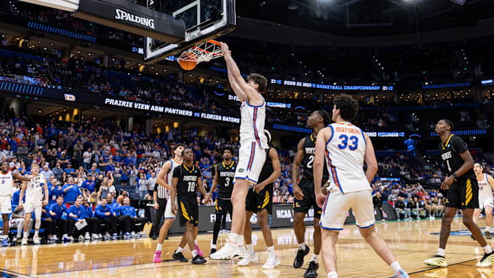 Olivier Rioux dunks in the Florida Gators' win over Prairie View A&M on Friday in the NCAA Tournament.
