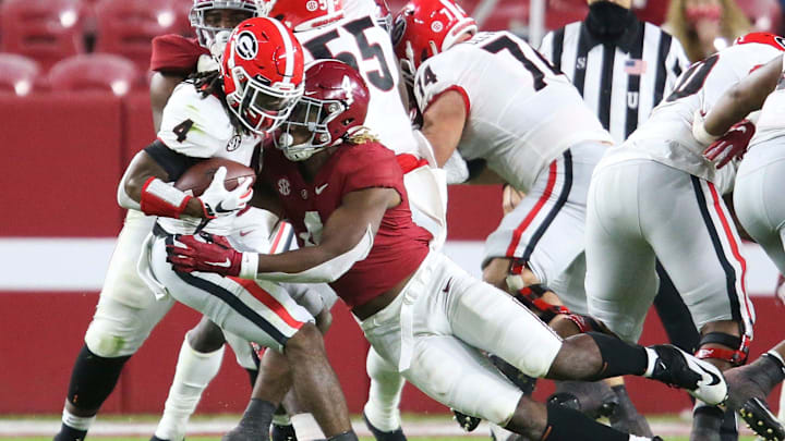 Alabama linebacker Christopher Allen (4) tackles Georgia running back James Cook (4) for a loss during Alabama's 41-24 win over Georgia in Bryant-Denny Stadium Saturday, Oct. 17, 2020. [Staff Photo/Gary Cosby Jr.]

Alabama Vs Georgia Sec Football