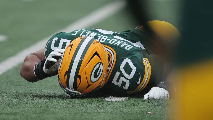 Green Bay Packers offensive line Zach Bako-Bewele (50) lays on the turf after injuring a knee against the Jets. Green Bay Packers offensive line Zach Bako-Bewele (50) lays on the turf after injuring a knee against the Jets.