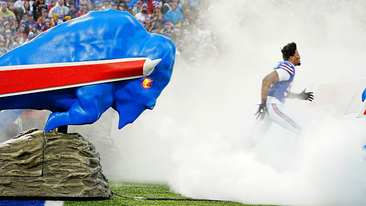 Buffalo Bills defensive end Greg Rousseau (50) takes the field during team introductions before the Bills home game against the New York Jets at Highmark Stadium in Orchard Park on Dec. 29, 2024. Buffalo Bills defensive end Greg Rousseau (50) takes the field during team introductions before the Bills home game against the New York Jets at Highmark Stadium in Orchard Park on Dec. 29, 2024.