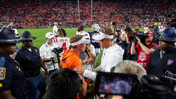 Auburn Tigers head coach Hugh Freeze and Mississippi Rebels head coach Lane Kiffin shake hands after the game as Auburn Tigers take on Mississippi Rebels at Jordan-Hare Stadium in Auburn, Ala., on Saturday, Oct. 21, 2023. Mississippi Rebels defeated Auburn Tigers 28-21. Auburn Tigers head coach Hugh Freeze and Mississippi Rebels head coach Lane Kiffin shake hands after the game as Auburn Tigers take on Mississippi Rebels at Jordan-Hare Stadium in Auburn, Ala., on Saturday, Oct. 21, 2023. Mississippi Rebels defeated Auburn Tigers 28-21.