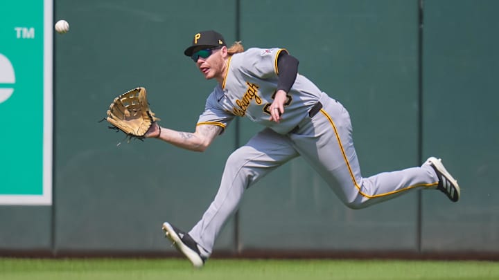 Minneapolis, Minnesota, USA; Pittsburgh Pirates outfielder Jack Suwinski (65) fields a fly ball against the Minnesota Twins in the seventh inning at Target Field.