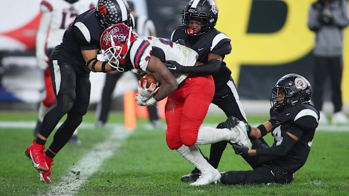 McKeesport's Kemon Spell, seen here playing against Aliquippa in the 2023 WPIAL Class 4A title game at Acrisure Stadium. Spell broke the Tigers' rushing record Friday night and will get another shot against Aliquippa at Pine-Richland next Saturday. McKeesport's Kemon Spell, seen here playing against Aliquippa in the 2023 WPIAL Class 4A title game at Acrisure Stadium. Spell broke the Tigers' rushing record Friday night and will get another shot against Aliquippa at Pine-Richland next Saturday.