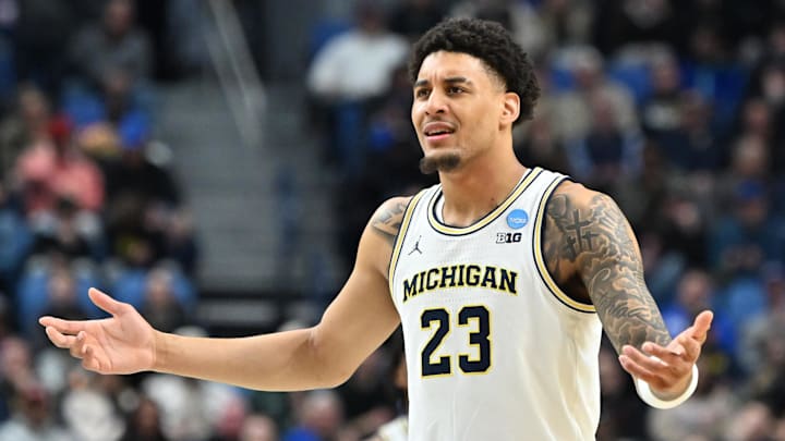 Michigan Wolverines forward Yaxel Lendeborg (23) reacts against the Howard Bison during the second half of a first round game of the men's 2026 NCAA Tournament at Keybank Center. 