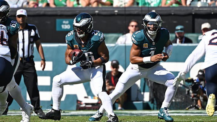Oct 5, 2025; Philadelphia, Pennsylvania, USA; Philadelphia Eagles running back Saquon Barkley (26) looks for room to run during the first quarter against the Denver Broncos at Lincoln Financial Field. Mandatory Credit: Eric Hartline-Imagn Images Oct 5, 2025; Philadelphia, Pennsylvania, USA; Philadelphia Eagles running back Saquon Barkley (26) looks for room to run during the first quarter against the Denver Broncos at Lincoln Financial Field. Mandatory Credit: Eric Hartline-Imagn Images