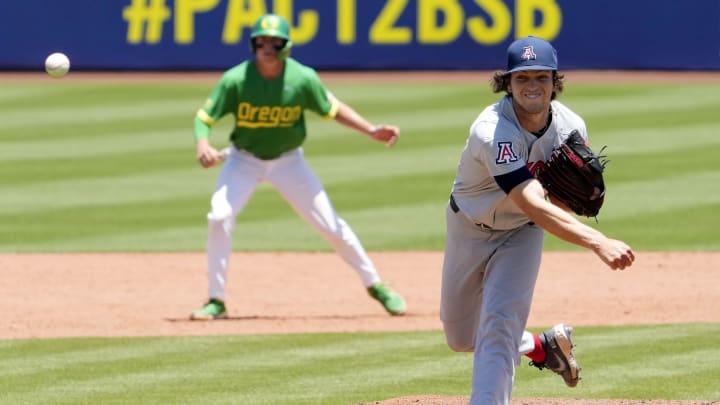 Arizona Wildcats pitcher Trevor Long throws against the Oregon Ducks during the Pac-12 baseball tournament. Arizona Wildcats pitcher Trevor Long throws against the Oregon Ducks during the Pac-12 baseball tournament.