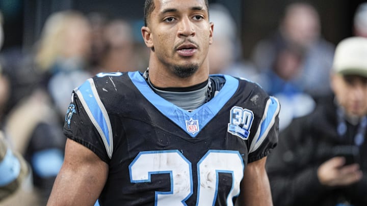 Dec 22, 2024; Charlotte, North Carolina, USA; Carolina Panthers running back Chuba Hubbard (30) after his game winning touchdown against the Arizona Cardinals during the second half at Bank of America Stadium. Dec 22, 2024; Charlotte, North Carolina, USA; Carolina Panthers running back Chuba Hubbard (30) after his game winning touchdown against the Arizona Cardinals during the second half at Bank of America Stadium.