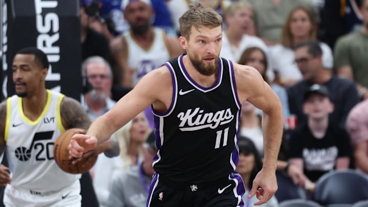Oct 15, 2024; Salt Lake City, Utah, USA; Sacramento Kings forward Domantas Sabonis (11) reacts to a shot against the Utah Jazz during the second quarter at Delta Center. Mandatory Credit: Rob Gray-Imagn Images