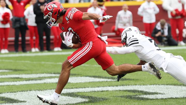 Sep 26, 2026; Ames, Iowa, USA;  Utah Utes wide receiver Braden Pegan (7) catches a touchdown pass in front of Iowa State Cyclones cornerback Seth Johnson (3) at Jack Trice Stadium.  Mandatory Credit: Reese Strickland-Imagn Images