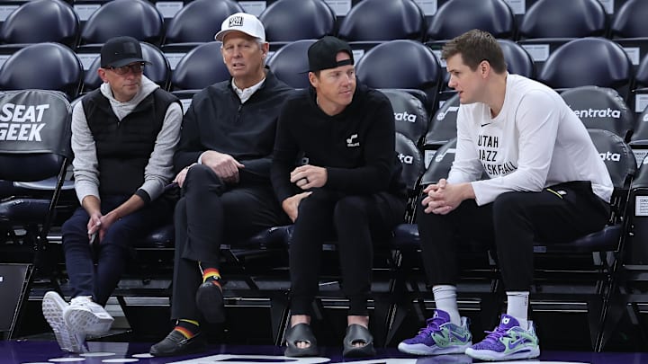Feb 6, 2024; Salt Lake City, Utah, USA; From left to right, Utah Jazz general manager Justin Zanik, CEO Danny Ainge, owner Ryan Smith and head coach Will Hardy sit court side before the game between the Utah Jazz and the Oklahoma City Thunder at Delta Center. Mandatory Credit: Rob Gray-Imagn Images