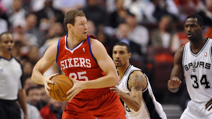 Feb 11, 2011; Philadelphia, PA, USA; Philadelphia 76ers forward Darius Songaila (25) is defended by San Antonio Spurs guard George Hill (3) during the second quarter at the Wells Fargo Center. The 76ers defeated the Spurs 77-71. Mandatory Credit: Howard Smith-Imagn Images Feb 11, 2011; Philadelphia, PA, USA; Philadelphia 76ers forward Darius Songaila (25) is defended by San Antonio Spurs guard George Hill (3) during the second quarter at the Wells Fargo Center. The 76ers defeated the Spurs 77-71. Mandatory Credit: Howard Smith-Imagn Images