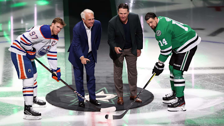 Oct 19, 2024; Dallas, Texas, USA; Dallas Stars former president Jim Lites and Stars former player Brenden Morrow drop a ceremonial puck with Edmonton Oilers center Connor McDavid (97) and Dallas Stars left wing Jamie Benn (14) before a game at American Airlines Center. Mandatory Credit: Tim Heitman-Imagn Images