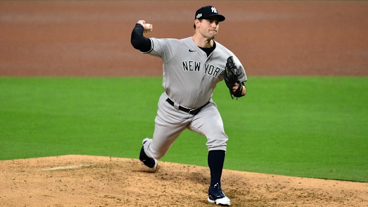Oct 6, 2020; San Diego, California, USA; New York Yankees relief pitcher Adam Ottavino (0) delivers a pitch in the 4th inning against the Tampa Bay Rays during game two of the 2020 ALDS at Petco Park. Oct 6, 2020; San Diego, California, USA; New York Yankees relief pitcher Adam Ottavino (0) delivers a pitch in the 4th inning against the Tampa Bay Rays during game two of the 2020 ALDS at Petco Park.