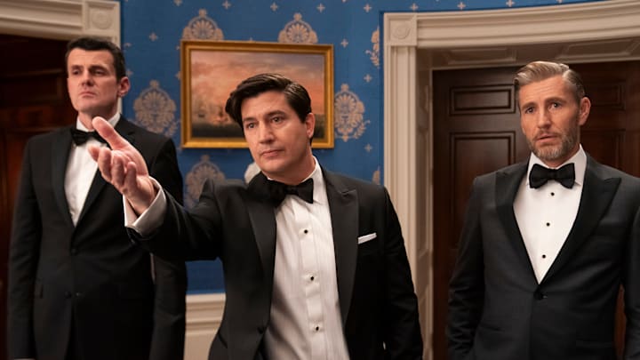 The Residence. (L to R) Nathan Lovejoy as Ambassador Alden Tamridge, Ken Marino as Harry Hollinger, Brett Tucker as David Rylance in episode 102 of The Residence