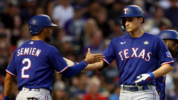 Oct 30, 2023; Phoenix, AZ, USA; Texas Rangers shortstop Corey Seager (5) celebrates with second