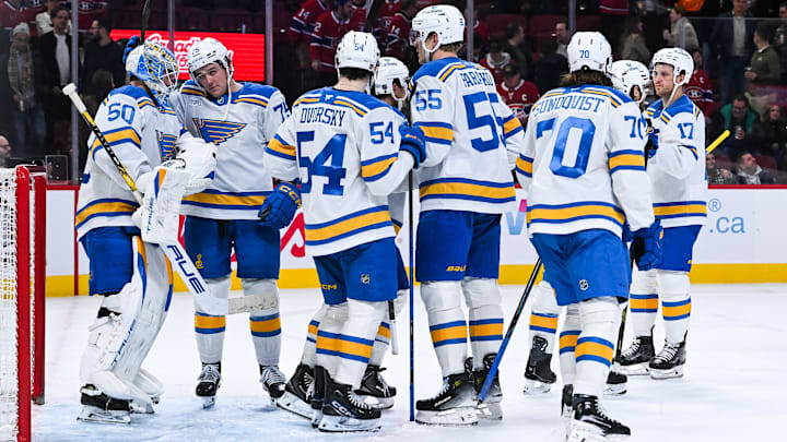 Dec 7, 2025; Montreal, Quebec, CAN; St. Louis Blues players gather together to celebrate their win against the Montreal Canadiens at Bell Centre. Mandatory Credit: David Kirouac-Imagn Images Dec 7, 2025; Montreal, Quebec, CAN; St. Louis Blues players gather together to celebrate their win against the Montreal Canadiens at Bell Centre. Mandatory Credit: David Kirouac-Imagn Images