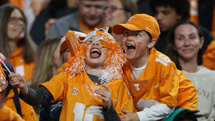 Nov 15, 2025; Knoxville, Tennessee, USA;  Young Tennessee Volunteers fans during the second half against the New Mexico State Aggies at Neyland Stadium. Mandatory Credit: Randy Sartin-Imagn Images