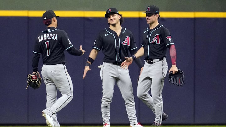 Arizona Diamondbacks left fielder Jorge Barrosa (1), center fielder Alek Thomas (5) and right fielder Corbin Carroll (7) celebrate a win over the Milwauk at American Family Field on April 29. Arizona Diamondbacks left fielder Jorge Barrosa (1), center fielder Alek Thomas (5) and right fielder Corbin Carroll (7) celebrate a win over the Milwauk at American Family Field on April 29.