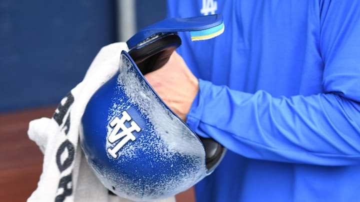 Apr 6, 2025; Philadelphia, Pennsylvania, USA; Los Angeles Dodgers batting helmet gets cleaned up before game against the Philadelphia Phillies at Citizens Bank Park. Mandatory Credit: Eric Hartline-Imagn Images Apr 6, 2025; Philadelphia, Pennsylvania, USA; Los Angeles Dodgers batting helmet gets cleaned up before game against the Philadelphia Phillies at Citizens Bank Park. Mandatory Credit: Eric Hartline-Imagn Images