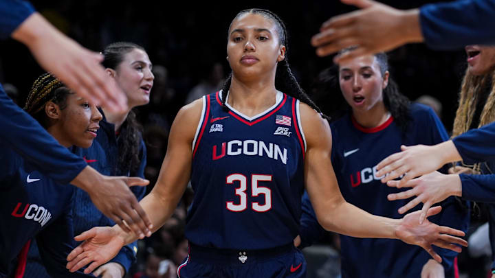Nov 30, 2025; Cincinnati, Ohio, USA;  UConn Huskies guard Azzi Fudd (35) takes the court during player introductions before the game against the Xavier Musketeers at the Cintas Center. Mandatory Credit: Aaron Doster-Imagn Images