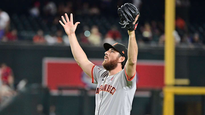 Sep 23, 2024; Phoenix, Arizona, USA;  San Francisco Giants pitcher Ryan Walker (74) celebrates after defeating the Arizona Diamondbacks at Chase Field.