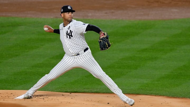 Oct 29, 2024; New York, New York, USA; New York Yankees pitcher Luis Gil (81) throws during the first inning in game four of the 2024 MLB World Series against the Los Angeles Dodgers at Yankee Stadium. Mandatory Credit: John Jones-Imagn Images Oct 29, 2024; New York, New York, USA; New York Yankees pitcher Luis Gil (81) throws during the first inning in game four of the 2024 MLB World Series against the Los Angeles Dodgers at Yankee Stadium. Mandatory Credit: John Jones-Imagn Images