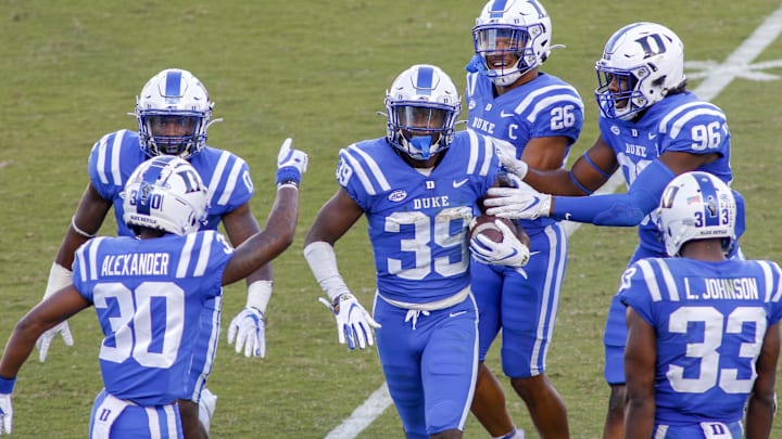 Oct 3, 2020; Durham, North Carolina, USA;  Teammates celebrate with Duke Blue Devils cornerback