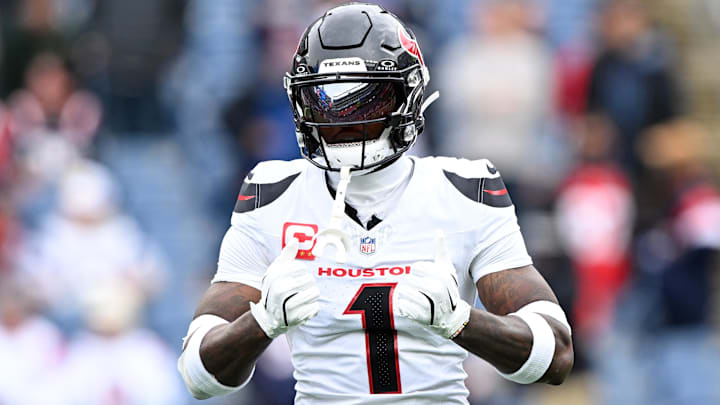 Oct 13, 2024; Foxborough, Massachusetts, USA; Houston Texans wide receiver Stefon Diggs (1) reacts before a game against the New England Patriots at Gillette Stadium. 