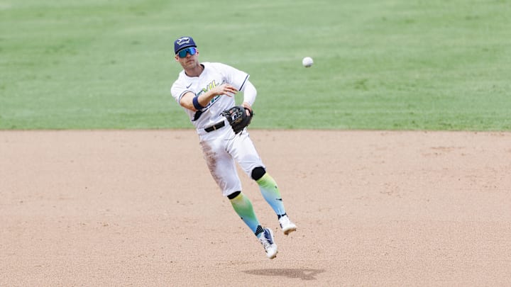 Aug 2, 2025; St. Petersburg, Florida, USA; Tampa Bay Rays short stop Taylor Walls (6) throws out Los Angeles Dodgers second baseman Miguel Rojas (72) (not pictured) at first base during the eighth inning at George M. Steinbrenner Field. Mandatory Credit: Morgan Tencza-Imagn Images