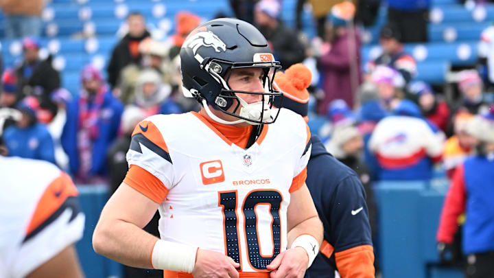 Jan 12, 2025; Orchard Park, New York, USA; Denver Broncos quarterback Bo Nix (10) warms up before a game against the Buffalo Bills in an AFC wild card game at Highmark Stadium. Mandatory Credit: Mark Konezny-Imagn Images Jan 12, 2025; Orchard Park, New York, USA; Denver Broncos quarterback Bo Nix (10) warms up before a game against the Buffalo Bills in an AFC wild card game at Highmark Stadium. Mandatory Credit: Mark Konezny-Imagn Images