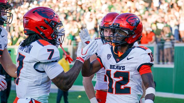 Oct 3, 2026; Fort Collins, Colorado, USA;  Oregon State Beavers wide receiver Jesse Legree (12) celebrates his touchdown against the Colorado State Rams with Aeryn Hampton in the first half  at Sonny Lubick Field at Canvas Stadium.  Mandatory Credit: Andrew Rydland-Imagn Images