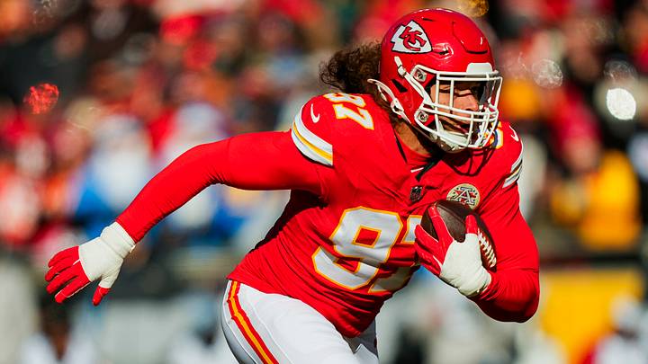 Dec 14, 2025; Kansas City, Missouri, USA; Kansas City Chiefs defensive end Ashton Gillotte (97) returns an interception during the first half against the Los Angeles Chargers at GEHA Field at Arrowhead Stadium. Mandatory Credit: Jay Biggerstaff-Imagn Images Dec 14, 2025; Kansas City, Missouri, USA; Kansas City Chiefs defensive end Ashton Gillotte (97) returns an interception during the first half against the Los Angeles Chargers at GEHA Field at Arrowhead Stadium. Mandatory Credit: Jay Biggerstaff-Imagn Images