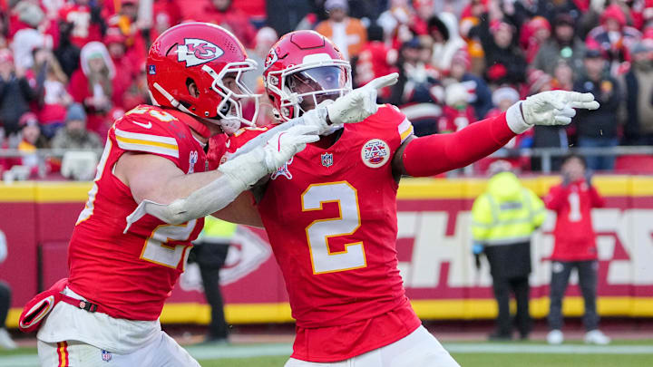 Dec 21, 2024; Kansas City, Missouri, USA; Kansas City Chiefs cornerback Joshua Williams (2) celebrates with linebacker Drue Tranquill (23) after a sack against the Houston Texans during the second half at GEHA Field at Arrowhead Stadium. Mandatory Credit: Denny Medley-Imagn Images