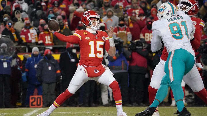 Jan 13, 2024; Kansas City, Missouri, USA; Kansas City Chiefs quarterback Patrick Mahomes (15) throws under pressure from Miami Dolphins defensive end Emmanuel Ogbah (91) during the first half of the 2024 AFC wild card game at GEHA Field at Arrowhead Stadium. Jan 13, 2024; Kansas City, Missouri, USA; Kansas City Chiefs quarterback Patrick Mahomes (15) throws under pressure from Miami Dolphins defensive end Emmanuel Ogbah (91) during the first half of the 2024 AFC wild card game at GEHA Field at Arrowhead Stadium.