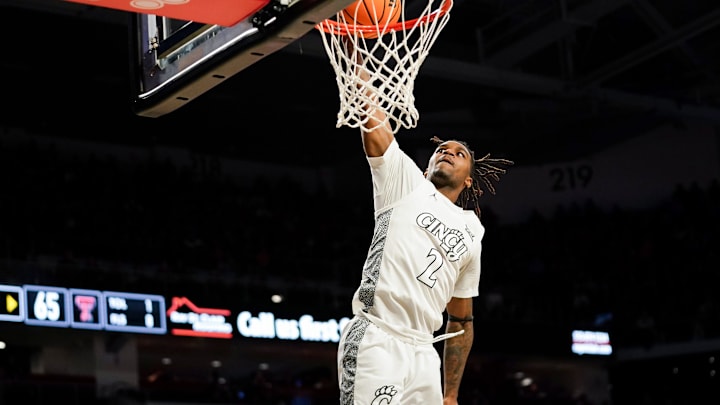 Cincinnati Bearcats guard Jizzle James (2) dunks the ball in the second half of a NCAA men’s basketball game between the Cincinnati Bearcats and Texas Tech Red Raiders, Tuesday, Jan. 21, 2025, at Fifth Third Arena in Cincinnati. Red Raiders won 81-71.