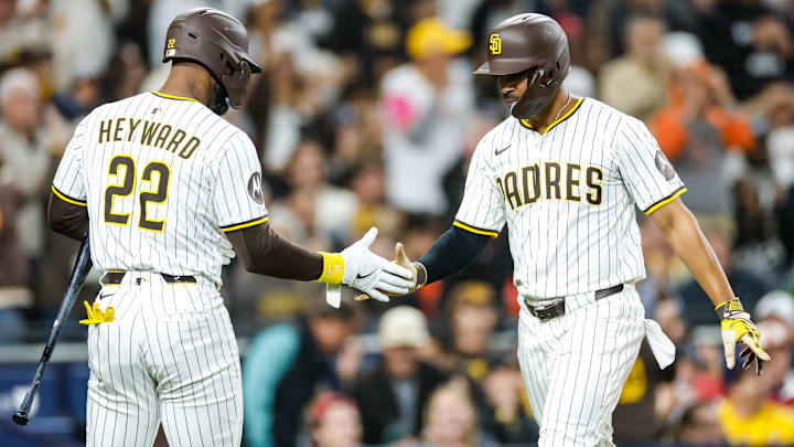 May 13, 2025; San Diego, California, USA; San Diego Padres shortstop Xander Bogaerts (2) celebrates with left fielder Jason Heyward (22) after scoring a run during the fifth inning against the Los Angeles Angels at Petco Park. Mandatory Credit: David Frerker-Imagn Images May 13, 2025; San Diego, California, USA; San Diego Padres shortstop Xander Bogaerts (2) celebrates with left fielder Jason Heyward (22) after scoring a run during the fifth inning against the Los Angeles Angels at Petco Park. Mandatory Credit: David Frerker-Imagn Images