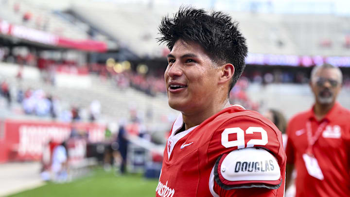 Oct 18, 2025; Houston, Texas, USA; Houston Cougars kicker Ethan Sanchez (92) reacts after kicks the game winning field goal against the Arizona Wildcats at TDECU Stadium. Mandatory Credit: Maria Lysaker-Imagn Images 