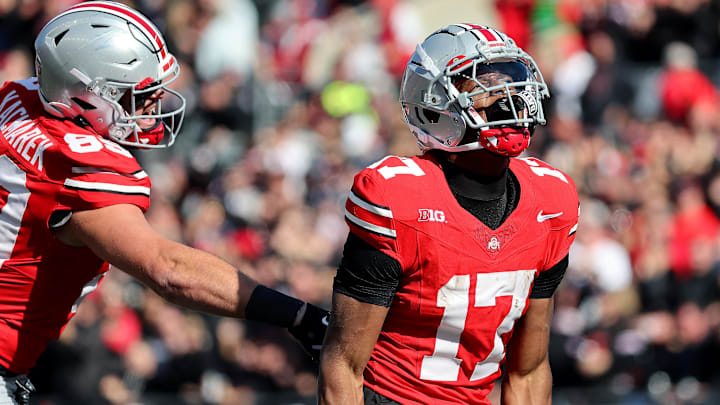 Ohio State Buckeyes wide receiver Carnell Tate (17) celebrates a long catch during the third quarter against the Penn State Nittany Lions at Ohio Stadium. 