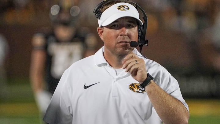 Aug 31, 2023; Columbia, Missouri, USA; Missouri Tigers head coach Eli Drinkwitz watches play against the South Dakota Coyotes during the game at Faurot Field at Memorial Stadium. Mandatory Credit: Denny Medley-Imagn Images