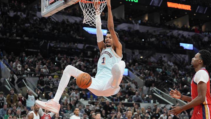 Dec 8, 2024; San Antonio, Texas, USA; San Antonio Spurs center Victor Wembanyama (1) dunks in the second half against the New Orleans Pelicans at Frost Bank Center.