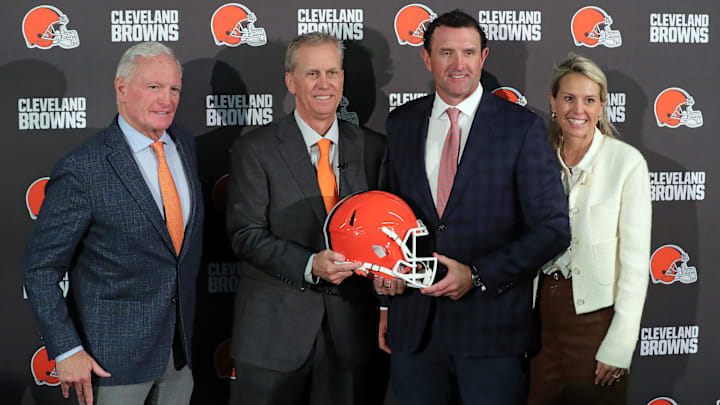New Cleveland Browns head coach Todd Monken, center, poses with members of the ownership group, from left, Jimmy Haslam, JW Johnson and Whitney Haslam-Johnson during Monken’s introductory press conference at the team's training facility, Feb. 3, 2026.