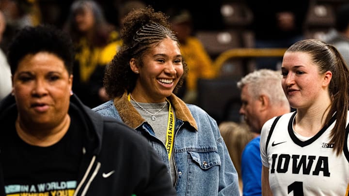 Iowa women’s basketball recruit Nation Williams talks to Iowa guard Taylor Stremlow (1) after the Hawkeyes basketball game against the Michigan Wolverines Feb. 22, 2026 at Carver-Hawkeye Arena in Iowa City, Iowa. Iowa women’s basketball recruit Nation Williams talks to Iowa guard Taylor Stremlow (1) after the Hawkeyes basketball game against the Michigan Wolverines Feb. 22, 2026 at Carver-Hawkeye Arena in Iowa City, Iowa.