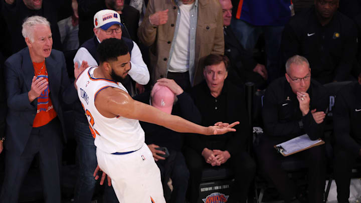 May 23, 2025; New York, New York, USA; New York Knicks center Karl-Anthony Towns (32) celebrates after scoring on a three point shot against the Indiana Pacers in the second quarter during game two of the eastern conference finals for the 2025 NBA Playoffs at Madison Square Garden. Mandatory Credit: Vincent Carchietta-Imagn Images