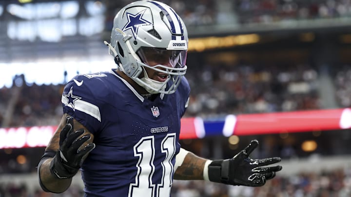 Dallas Cowboys linebacker Micah Parsons (11) celebrates after a sack during the first quarter against the Washington Commanders at AT&T Stadium.