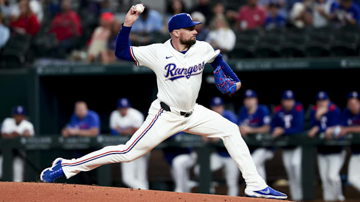 Arlington, Texas, USA;  Texas Rangers starting pitcher Nathan Eovaldi (17) throws during the first inning against the Athletics at Globe Life Field.